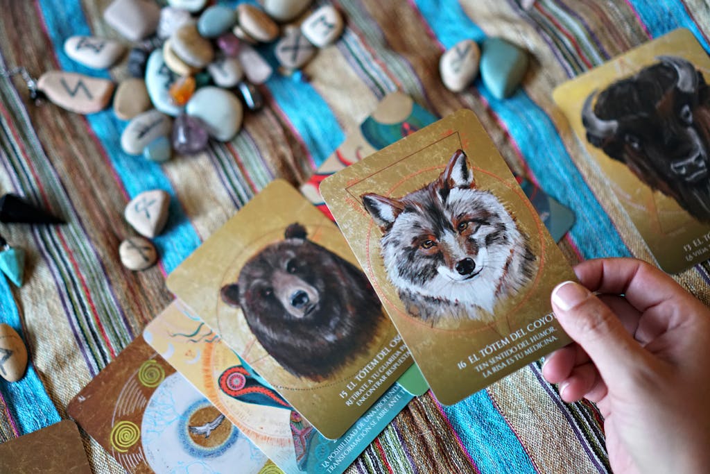 Explore mystical animal spirit cards and stones enhancing spiritual readings.